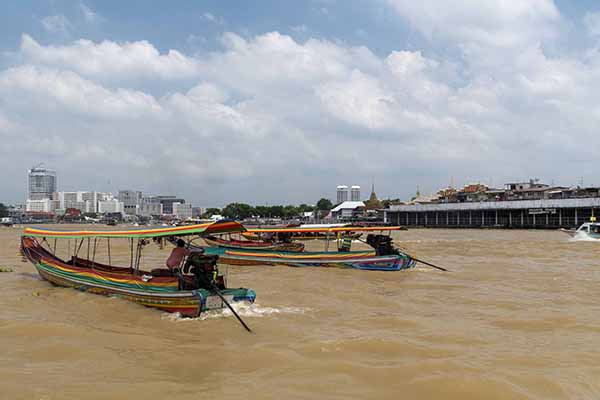 Bangkok longboats on the Chao Phraya river